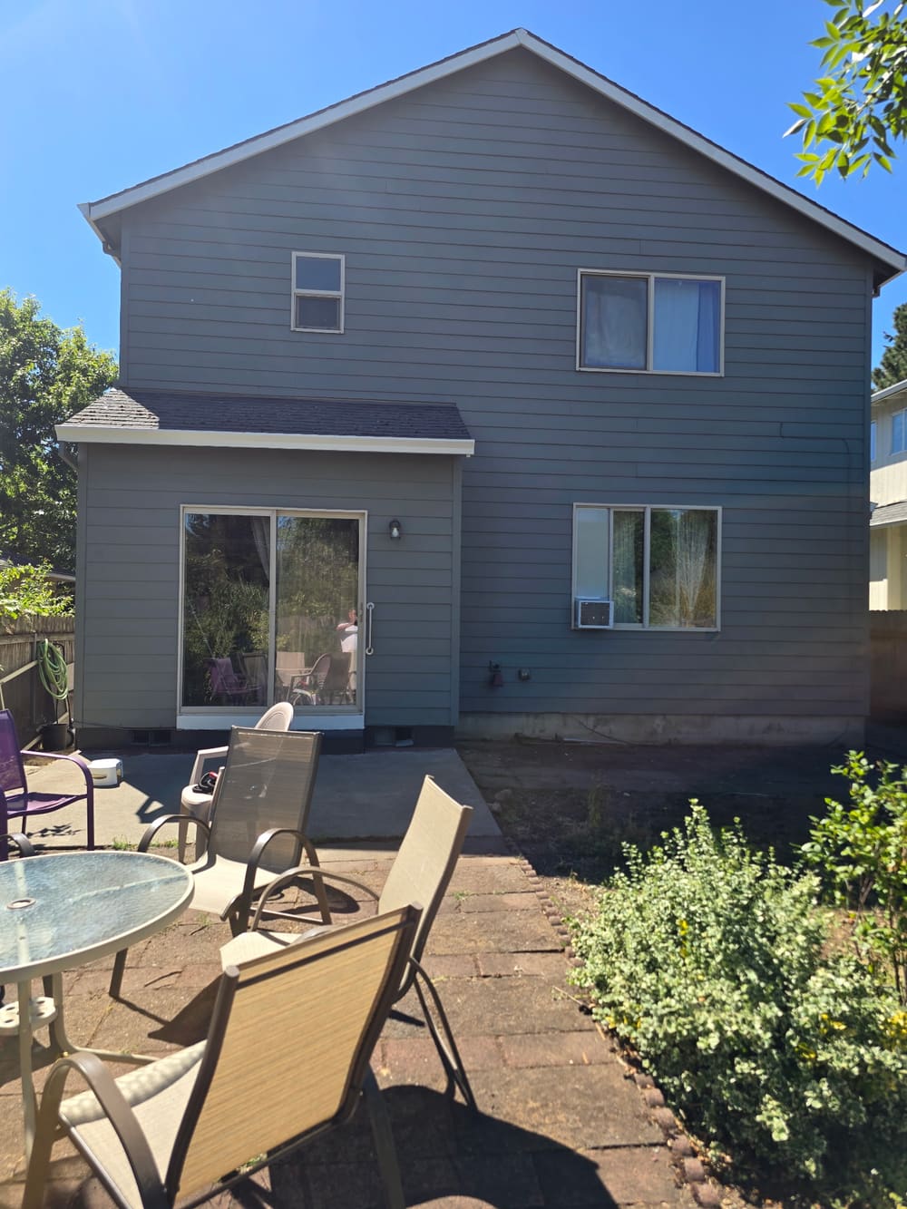 Rear exterior of a home after a full repaint